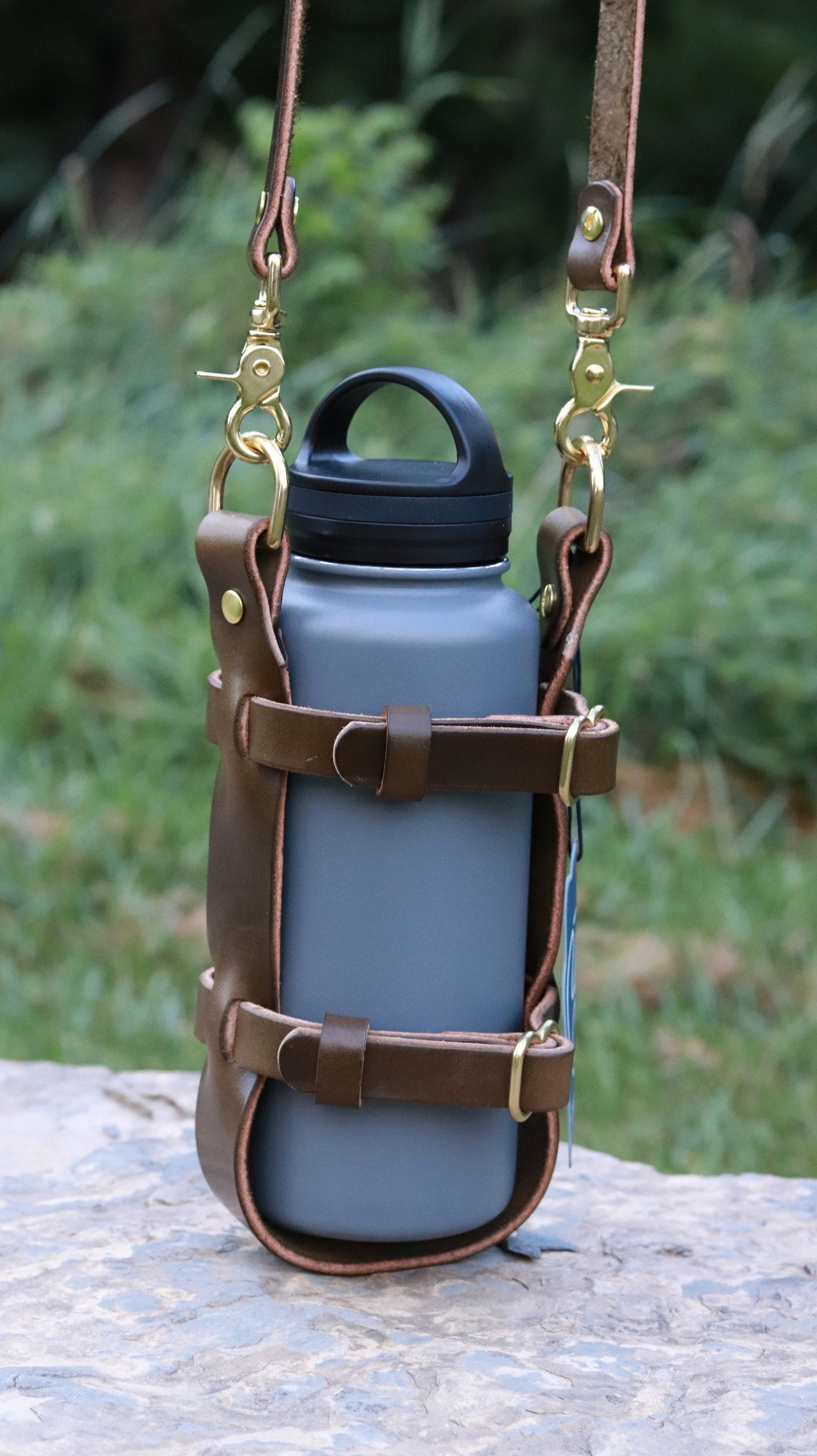 Adjustable leather water bottle carrier made with Full Grain Wickett and Craig Olive Green harness with shoulder strap Water Bottle harness