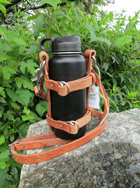 Adjustable Hermann Oak harness leather water bottle carrier with shoulder strap,