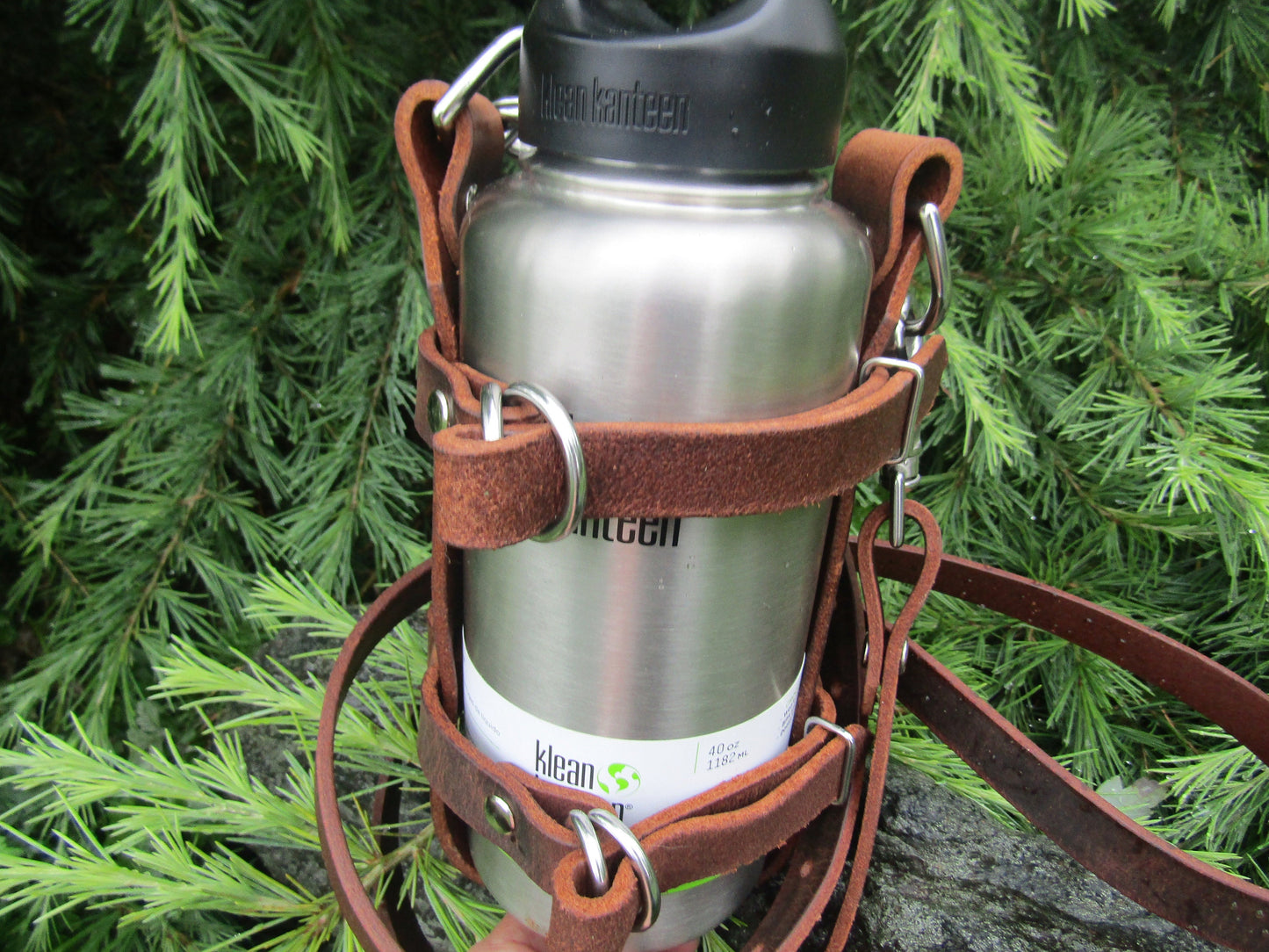 Adjustable Full Grain Water Buffalo leather water bottle carrier with shoulder strap, stainless steel hardware, can be made for any bottle