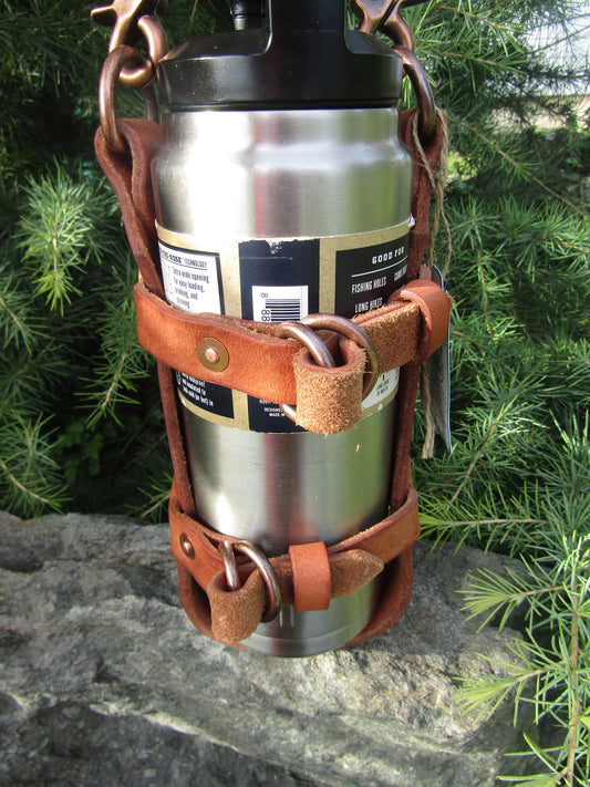 Adjustable Hermann Oak harness leather water bottle carrier with shoulder strap, copper hardware