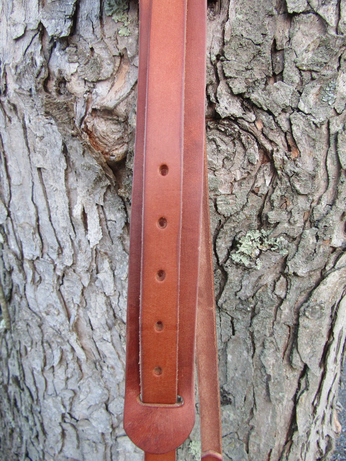 Adjustable Hermann Oak harness leather water bottle carrier with shoulder strap, antique copper finish hardware