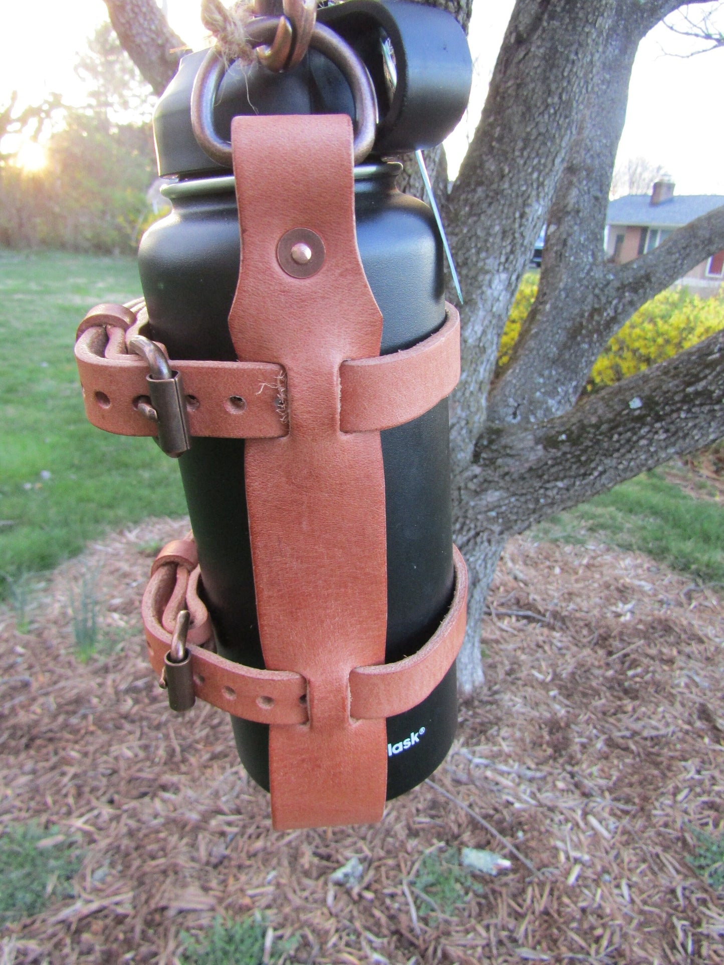 Adjustable Hermann Oak harness leather water bottle carrier with shoulder strap, antique copper finish hardware